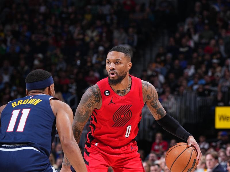 DENVER, CO - JANUARY 17: Damian Lillard #0 of the Portland Trail Blazers handles the ball during the game against the Denver Nuggets on January 17, 2023 at the Ball Arena in Denver, Colorado. NOTE TO USER: User expressly acknowledges and agrees that, by downloading and/or using this Photograph, user is consenting to the terms and conditions of the Getty Images License Agreement. Mandatory Copyright Notice: Copyright 2023 NBAE (Photo by Garrett Ellwood/NBAE via Getty Images)