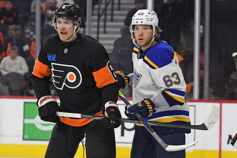 Oct 31, 2024; Philadelphia, Pennsylvania, USA; Philadelphia Flyers defenseman Travis Sanheim (6) and St. Louis Blues left wing Jake Neighbours (63) battle for position during the second period at Wells Fargo Center. Mandatory Credit: Eric Hartline-Imagn Images