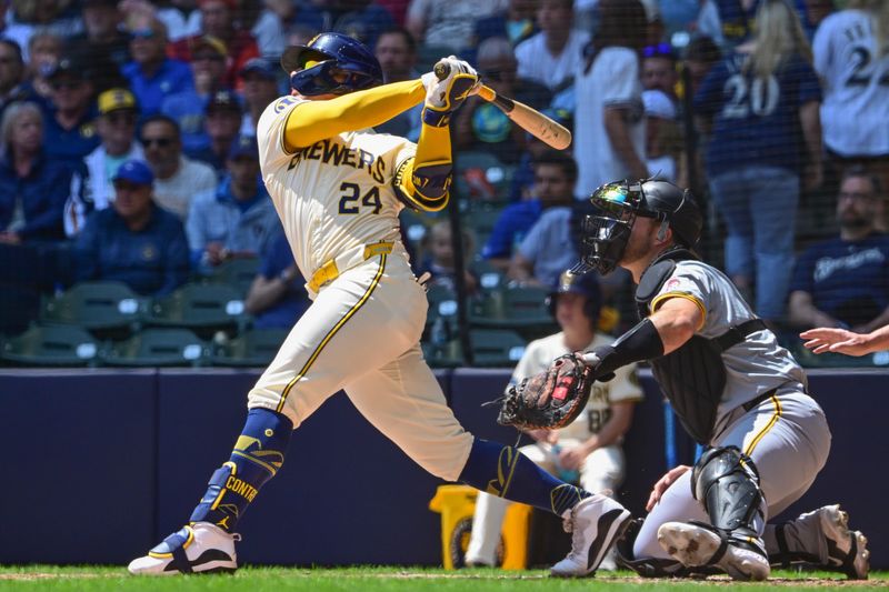 May 15, 2024; Milwaukee, Wisconsin, USA; Milwaukee Brewers designated hitter William Contreras (24) hits a 3-run home run in the third inning against the Pittsburgh Pirates at American Family Field. Mandatory Credit: Benny Sieu-USA TODAY Sports