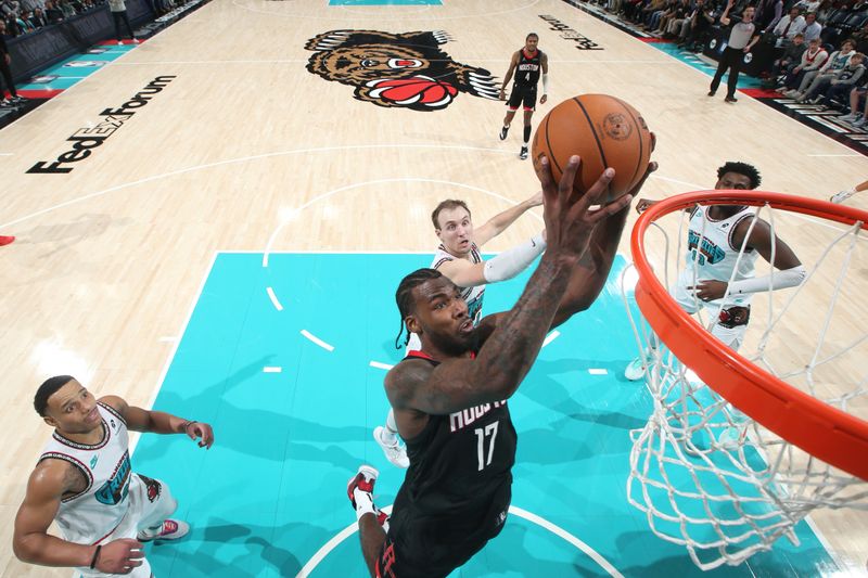 MEMPHIS, TN - JANUARY 30: Tari Eason #17 of the Houston Rockets drives to the basket during the game against the Memphis Grizzlies on January 30, 2025 at FedExForum in Memphis, Tennessee. NOTE TO USER: User expressly acknowledges and agrees that, by downloading and or using this photograph, User is consenting to the terms and conditions of the Getty Images License Agreement. Mandatory Copyright Notice: Copyright 2025 NBAE (Photo by Joe Murphy/NBAE via Getty Images)