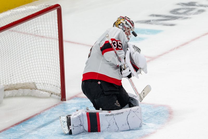 Nov 27, 2024; San Jose, California, USA; Ottawa Senators goaltender Linus Ullmark (35) makes a save against the San Jose Sharks during the second period at SAP Center at San Jose. Mandatory Credit: Neville E. Guard-Imagn Images