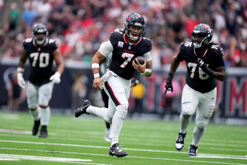 Houston Texans quarterback C.J. Stroud (7) runs up field during the second half of an NFL football game against the Jacksonville Jaguars, Sunday, Sept. 29, 2024, in Houston. (AP Photo/Eric Christian Smith)