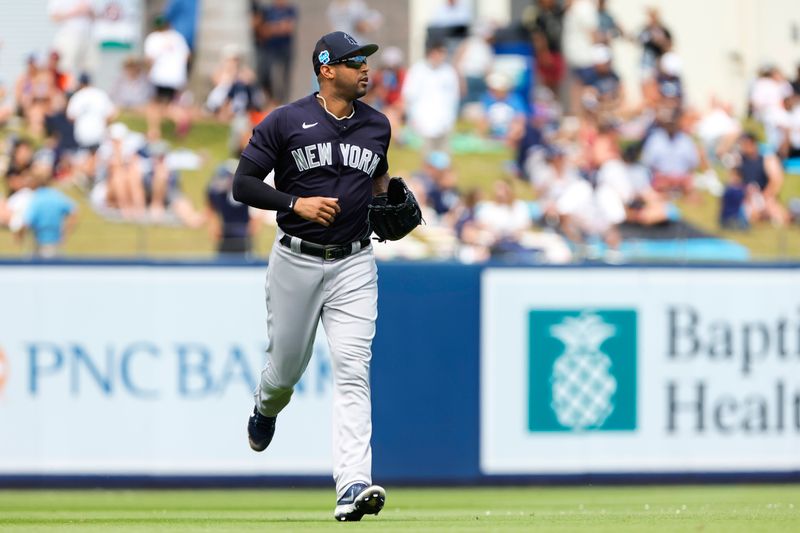 Mar 22, 2023; West Palm Beach, Florida, USA; New York Yankees left fielder Aaron Hicks (31) returns to the dugout after the sixth inning against the Washington Nationals at The Ballpark of the Palm Beaches. Mandatory Credit: Sam Navarro-USA TODAY Sports