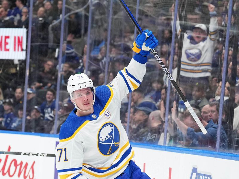 Mar 6, 2024; Toronto, Ontario, CAN; Buffalo Sabres left wing Victor Olofsson (71) celebrates scoring a goal against the Toronto Maple Leafs during the second period at Scotiabank Arena. Mandatory Credit: Nick Turchiaro-USA TODAY Sports