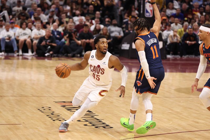 CLEVELAND, OH - APRIL 15: Donovan Mitchell #45 of the Cleveland Cavaliers dribbles the ball during Round 1 Game 1 of the 2023 NBA Playoffs against the New York Knicks on April 15, 2023 at Rocket Mortgage FieldHouse in Cleveland, Ohio. NOTE TO USER: User expressly acknowledges and agrees that, by downloading and/or using this Photograph, user is consenting to the terms and conditions of the Getty Images License Agreement. Mandatory Copyright Notice: Copyright 2023 NBAE (Photo by  Lauren Leigh Bacho/NBAE via Getty Images)