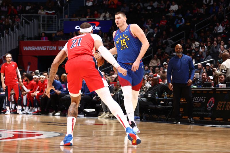 WASHINGTON, DC -? JANUARY 21: Nikola Jokic #15 of the Denver Nuggets dribbles the ball during the game against the Washington Wizards on January 21, 2024 at Capital One Arena in Washington, DC. NOTE TO USER: User expressly acknowledges and agrees that, by downloading and or using this Photograph, user is consenting to the terms and conditions of the Getty Images License Agreement. Mandatory Copyright Notice: Copyright 2024 NBAE (Photo by Kenny Giarla/NBAE via Getty Images)