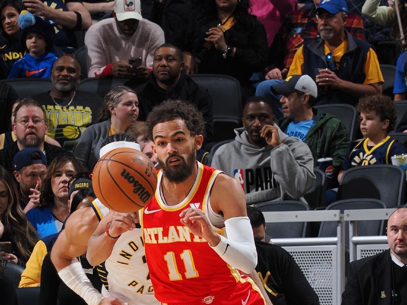 INDIANAPOLIS, IN - FEBRUARY 1: Trae Young #11 of the Atlanta Hawks passes the ball during the game against the Indiana Pacers on February 1, 2025 at Gainbridge Fieldhouse in Indianapolis, Indiana. NOTE TO USER: User expressly acknowledges and agrees that, by downloading and or using this Photograph, user is consenting to the terms and conditions of the Getty Images License Agreement. Mandatory Copyright Notice: Copyright 2025 NBAE (Photo by Ron Hoskins/NBAE via Getty Images)