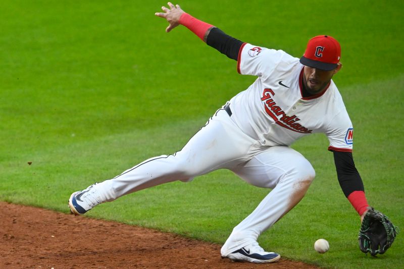 Apr 28, 2025; Cleveland, Ohio, USA; Cleveland Guardians second baseman Gabriel Arias (13) fields a ground ball in the fifth inning against the Minnesota Twins at Progressive Field. Mandatory Credit: David Richard-Imagn Images