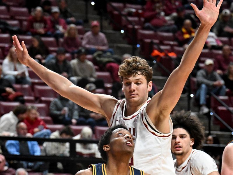 Jan 28, 2026; Tallahassee, Florida, USA; California Golden Bears Dai Dai Ames (7) looks to shoot as Florida State Seminoles forward Alex Steen (25) defends during the second half at Donald L. Tucker Center. Mandatory Credit: Melina Myers-Imagn Images