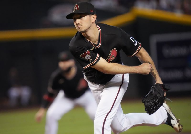 Jul 9, 2023; Phoenix, Arizona, USA; Arizona Diamondbacks Zach Davies (27) pitches in the first inning against the Pittsburgh Pirates at Chase Field. Mandatory Credit: Joe Rondone-USA TODAY Sports