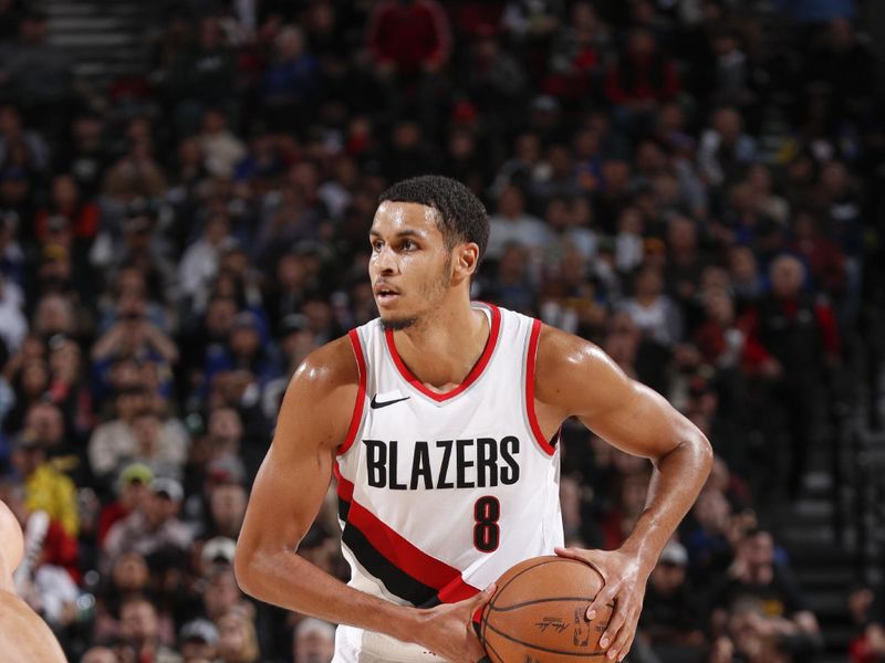 PORTLAND, OR - APRIL 11:  Kris Murray #8 of the Portland Trail Blazers handles the ball during the game  on April 11, 2024 at the Moda Center Arena in Portland, Oregon. NOTE TO USER: User expressly acknowledges and agrees that, by downloading and or using this photograph, user is consenting to the terms and conditions of the Getty Images License Agreement. Mandatory Copyright Notice: Copyright 2024 NBAE (Photo by Cameron Browne/NBAE via Getty Images)