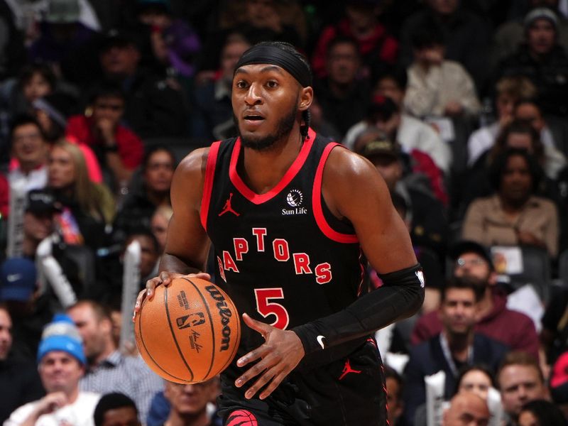 TORONTO, CANADA - JANUARY 3: Immanuel Quickley #5 of the Toronto Raptors brings the ball up court during the game against the Orlando Magic on January 3, 2025 at the Scotiabank Arena in Toronto, Ontario, Canada.  NOTE TO USER: User expressly acknowledges and agrees that, by downloading and or using this Photograph, user is consenting to the terms and conditions of the Getty Images License Agreement.  Mandatory Copyright Notice: Copyright 2025 NBAE(Photo by Mark Blinch/NBAE via Getty Images)