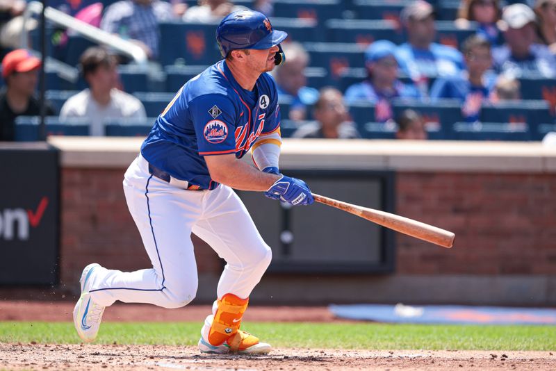 Jun 2, 2024; New York City, New York, USA;  New York Mets first baseman Pete Alonso (20) hits an RBI single during the third inning against the Arizona Diamondbacks at Citi Field. Mandatory Credit: Vincent Carchietta-USA TODAY Sports