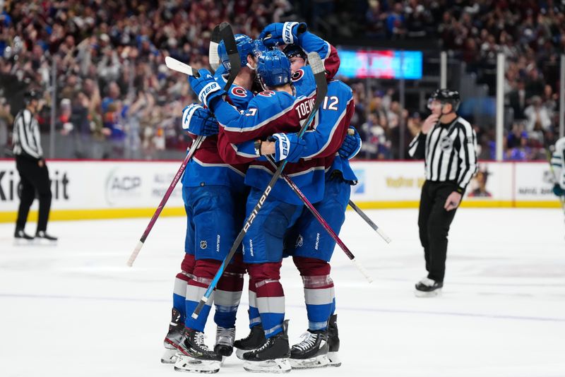 Dec 31, 2023; Denver, Colorado, USA; Members of the Colorado Avalanche celebrate an empty net goal in the third period against the San Jose Sharks at Ball Arena. Mandatory Credit: Ron Chenoy-USA TODAY Sports