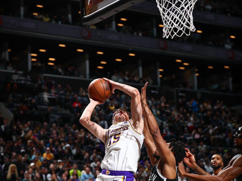 BROOKLYN, NY - MARCH 31: Austin Reaves #15 of the Los Angeles Lakers goes to the basket during the game on March 31, 2024 at Barclays Center in Brooklyn, New York. NOTE TO USER: User expressly acknowledges and agrees that, by downloading and or using this Photograph, user is consenting to the terms and conditions of the Getty Images License Agreement. Mandatory Copyright Notice: Copyright 2024 NBAE (Photo by David L. Nemec/NBAE via Getty Images)