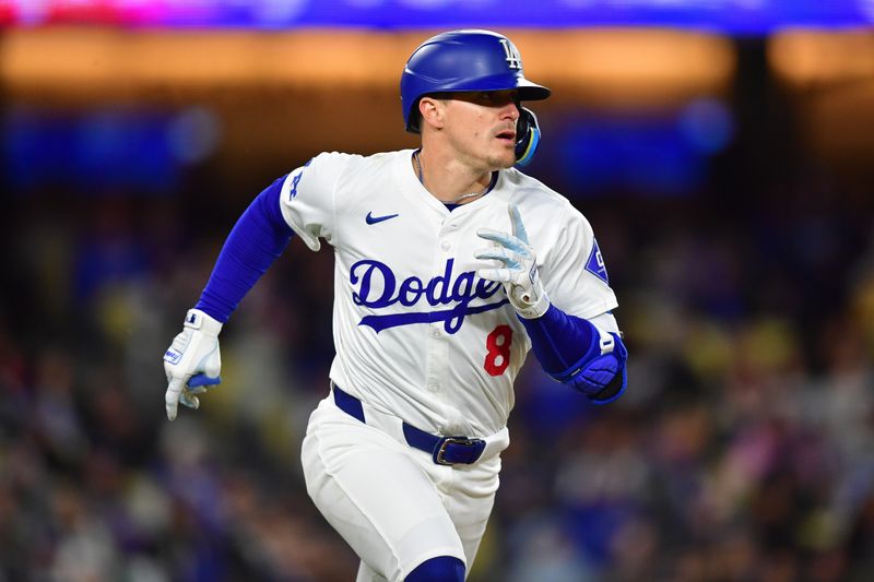 Apr 13, 2024; Los Angeles, California, USA; Los Angeles Dodgers left fielder Enrique Hernández (8) runs after hitting a single against the San Diego Padres during the sixth inning at Dodger Stadium. Mandatory Credit: Gary A. Vasquez-USA TODAY Sports