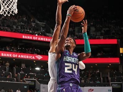 CHARLOTTE, NC - DECEMBER 23: Brandon Miller #24 of the Charlotte Hornets shoots the ball during the game against the Denver Nuggets on December 23, 2023 at Spectrum Center in Charlotte, North Carolina. NOTE TO USER: User expressly acknowledges and agrees that, by downloading and or using this photograph, User is consenting to the terms and conditions of the Getty Images License Agreement. Mandatory Copyright Notice: Copyright 2023 NBAE (Photo by Kent Smith/NBAE via Getty Images)