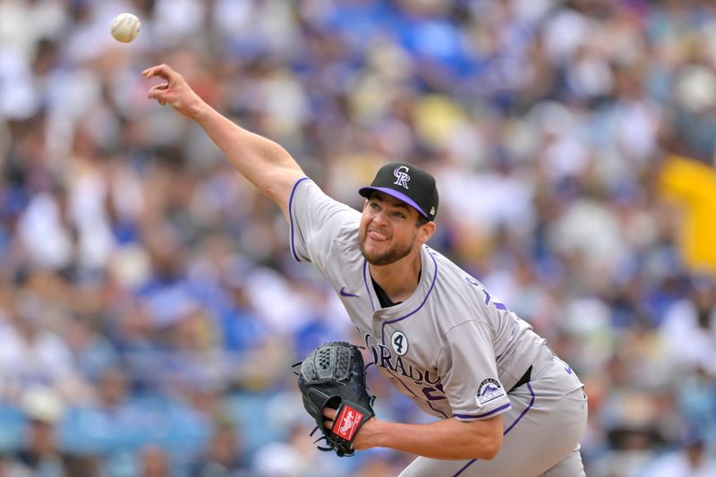 Jun 2, 2024; Los Angeles, California, USA;  Colorado Rockies pitcher Peter Lambert (20) delivers to the plate in the sixth inning against the Los Angeles Dodgers at Dodger Stadium. Credit: Jayne Kamin-Oncea-USA TODAY Sports