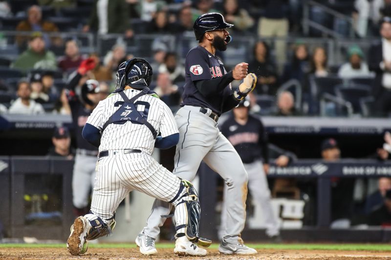 May 1, 2023; Bronx, New York, USA;  Cleveland Guardians shortstop Amed Rosario (1) reacts after scoring the tying the run in the ninth inning against the New York Yankees at Yankee Stadium. Mandatory Credit: Wendell Cruz-USA TODAY Sports