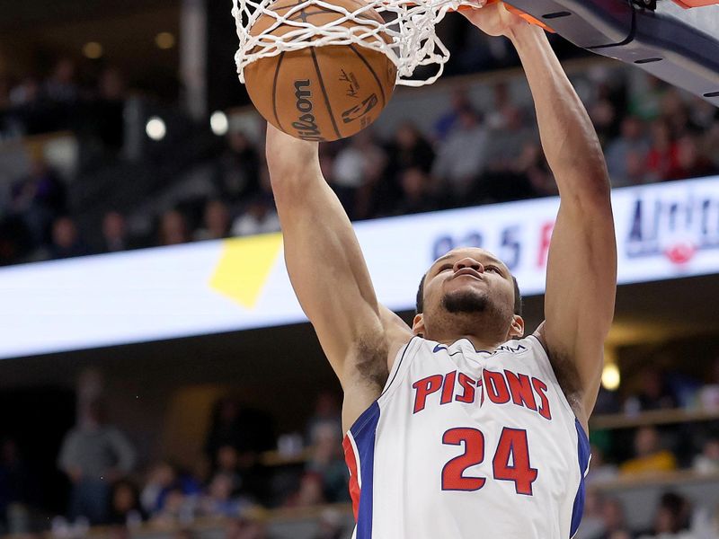 DENVER, COLORADO - JANUARY 07: Kevin Knox II #24 of the Detroit Pistons dunks on DeAndre Jordan #6 of the Denver Nuggets in the fourth quarter at Ball Arena on January 07, 2024 in Denver, Colorado. NOTE TO USER: User expressly acknowledges and agrees that, by downloading and or using this photograph, User is consenting to the terms and conditions of the Getty Images License Agreement.  (Photo by Matthew Stockman/Getty Images)