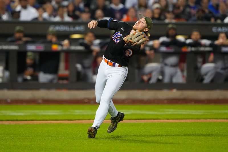 May 21, 2023; New York City, New York, USA; New York Mets third baseman Brett Baty (22) catches a fly ball hit by Cleveland Guardians left fielder Steven Kwan (38) (not pictured) during the sixth inning at Citi Field. Mandatory Credit: Gregory Fisher-USA TODAY Sports