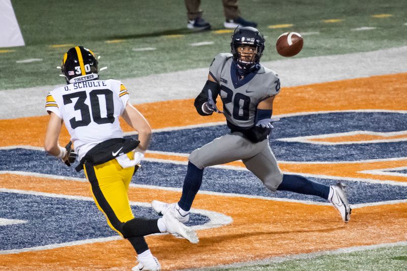 Dec 5, 2020; Champaign, Illinois, USA; Illinois Fighting Illini wide receiver Kyron Cumby (20) catches a pass for a touchdown against the Iowa Hawkeyes during the second half at Memorial Stadium. Mandatory Credit: Patrick Gorski-USA TODAY Sports