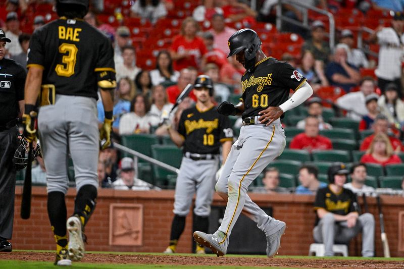 Sep 1, 2023; St. Louis, Missouri, USA;  Pittsburgh Pirates shortstop Liover Peguero (60) scores on a wild pitch by St. Louis Cardinals relief pitcher JoJo Romero (not pictured) during the tenth inning at Busch Stadium. Mandatory Credit: Jeff Curry-USA TODAY Sports