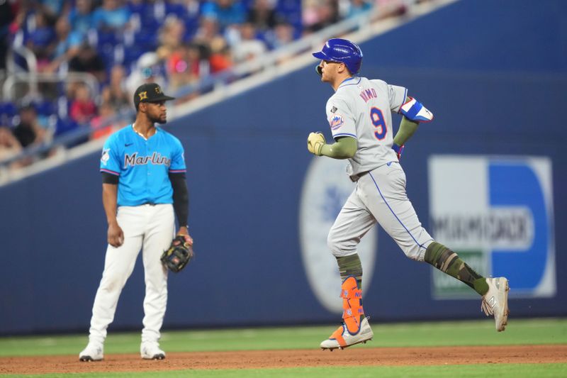 May 19, 2024; Miami, Florida, USA;  New York Mets designated hitter Brandon Nimmo (9) rounds the bases after hitting a two-run home run in the ninth inning against the Miami Marlins at loanDepot Park. Mandatory Credit: Jim Rassol-USA TODAY Sports