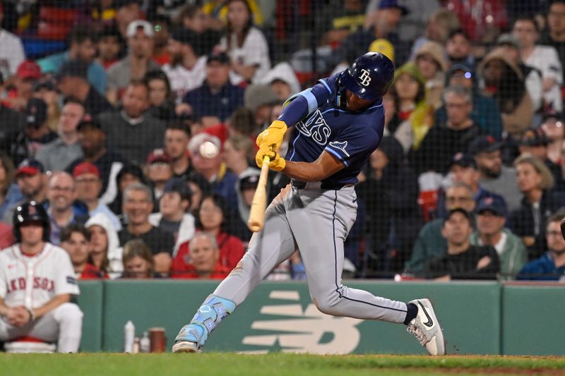 May 15, 2024; Boston, Massachusetts, USA; Tampa Bay Rays right fielder Richie Palacios (1) hits a single against the Boston Red Sox during the sixth inning at Fenway Park. Mandatory Credit: Eric Canha-USA TODAY Sports