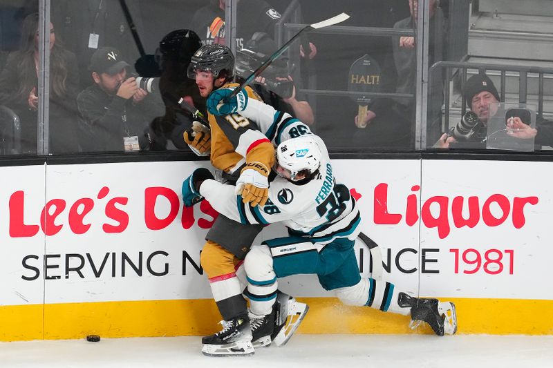 Oct 26, 2024; Las Vegas, Nevada, USA; Vegas Golden Knights center Brendan Brisson (19) is checked by San Jose Sharks defenseman Mario Ferraro (38) during the third period at T-Mobile Arena. Mandatory Credit: Stephen R. Sylvanie-Imagn Images