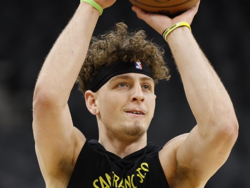 SAN ANTONIO, TX - MARCH 31:  Brandin Podziemski #2 of the Golden State Warriors warms up before their game against the San Antonio Spurs at Frost Bank Center on March 31, 2024 in San Antonio, Texas. NOTE TO USER: User expressly acknowledges and agrees that, by downloading and or using this photograph, User is consenting to terms and conditions of the Getty Images License Agreement. (Photo by Ronald Cortes/Getty Images)