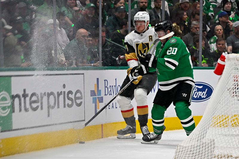 Apr 22, 2024; Dallas, Texas, USA; Vegas Golden Knights center Jack Eichel (9) and Dallas Stars defenseman Ryan Suter (20) chase the puck during the third period in game one of the first round of the 2024 Stanley Cup Playoffs at the American Airlines Center. Mandatory Credit: Jerome Miron-USA TODAY Sports