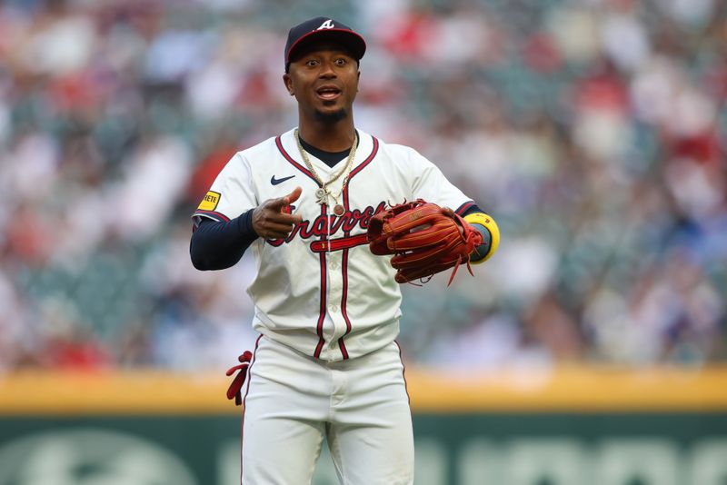 May 28, 2024; Atlanta, Georgia, USA; Atlanta Braves second baseman Ozzie Albies (1) warms up before a game against the Washington Nationals at Truist Park. Mandatory Credit: Brett Davis-USA TODAY Sports