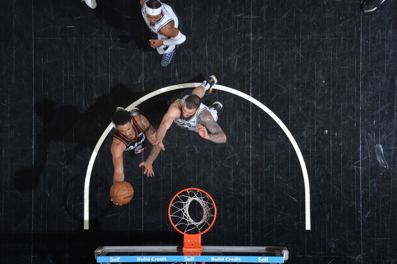 SAN ANTONIO, TX - APRIL 14: Jared Rhoden #8 of the Detroit Pistons drives to the basket during the game against the San Antonio Spurs on April 14, 2024 at the Frost Bank Center in San Antonio, Texas. NOTE TO USER: User expressly acknowledges and agrees that, by downloading and or using this photograph, user is consenting to the terms and conditions of the Getty Images License Agreement. Mandatory Copyright Notice: Copyright 2024 NBAE (Photos by Michael Gonzales/NBAE via Getty Images)