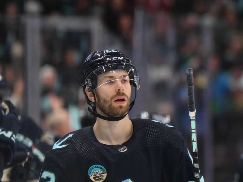 Mar 14, 2024; Seattle, Washington, USA; Seattle Kraken right wing Oliver Bjorkstrand (22) after scoring a goal against the Washington Capitals during the third period at Climate Pledge Arena. Mandatory Credit: Steven Bisig-USA TODAY Sports