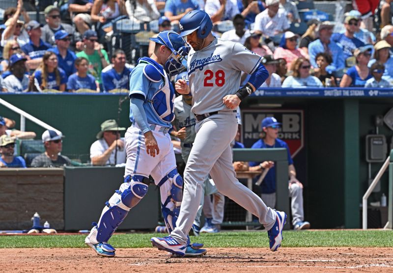 Jul 2, 2023; Kansas City, Missouri, USA;  Los Angeles Dodgers designated hitter J.D. Martinez (28) scores a run in the fourth inning against the Kansas City Royals at Kauffman Stadium. Mandatory Credit: Peter Aiken-USA TODAY Sports