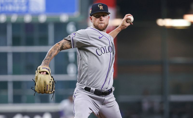 Jul 4, 2023; Houston, Texas, USA; Colorado Rockies starting pitcher Kyle Freeland (21) delivers a pitch during the fifth inning against the Houston Astros at Minute Maid Park. Mandatory Credit: Troy Taormina-USA TODAY Sports