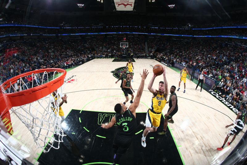 NEW ORLEANS, LA - MARCH 1:  T.J. McConnell #9 of the Indiana Pacers drives to the basket during the game against the New Orleans Pelicans on March 1, 2024 at the Smoothie King Center in New Orleans, Louisiana. NOTE TO USER: User expressly acknowledges and agrees that, by downloading and or using this Photograph, user is consenting to the terms and conditions of the Getty Images License Agreement. Mandatory Copyright Notice: Copyright 2024 NBAE (Photo by Layne Murdoch Jr./NBAE via Getty Images)