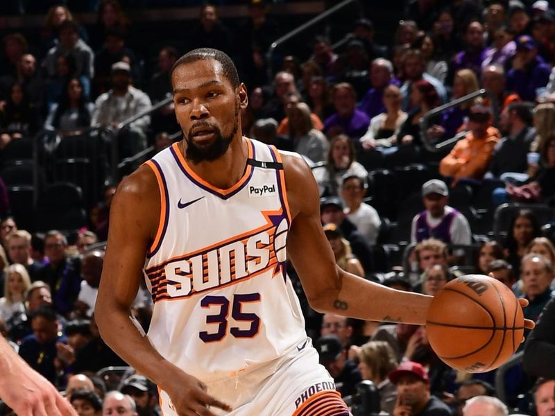 PHOENIX, AZ - JANUARY 27:  Kevin Durant #35 of the Phoenix Suns handles the ball during the game against the LA Clippers on January 27, 2025 at Footprint Center in Phoenix, Arizona. NOTE TO USER: User expressly acknowledges and agrees that, by downloading and or using this photograph, user is consenting to the terms and conditions of the Getty Images License Agreement. Mandatory Copyright Notice: Copyright 2025 NBAE (Photo by Kate Frese/NBAE via Getty Images)