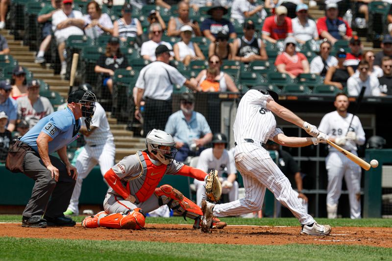 Jun 29, 2025; Chicago, Illinois, USA; Chicago White Sox catcher Kyle Teel (8) singles against the San Francisco Giants during the second inning at Rate Field. Mandatory Credit: Kamil Krzaczynski-Imagn Images