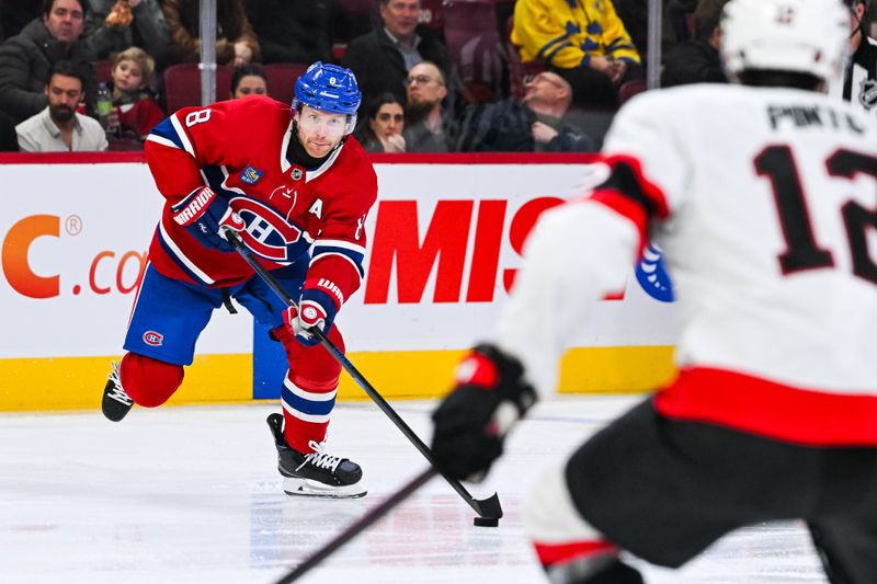 Dec 2, 2025; Montreal, Quebec, CAN; Montreal Canadiens defenseman Mike Matheson (8) plays the puck against the Ottawa Senators during the second period at Bell Centre. Mandatory Credit: David Kirouac-Imagn Images