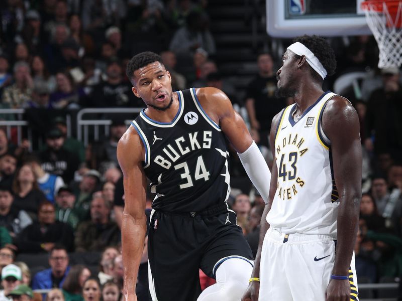 MILWAUKEE, WI - NOVEMBER 22:  Giannis Antetokounmpo #34 of the Milwaukee Bucks and Pascal Siakam #43 of the Indiana Pacers talk during the game between the Indiana Pacers and the Milwaukee Bucks during a Emirates NBA Cup on November 22, 2024 at Fiserv Forum Center in Milwaukee, Wisconsin. NOTE TO USER: User expressly acknowledges and agrees that, by downloading and or using this Photograph, user is consenting to the terms and conditions of the Getty Images License Agreement. Mandatory Copyright Notice: Copyright 2024 NBAE (Photo by Gary Dineen/NBAE via Getty Images).