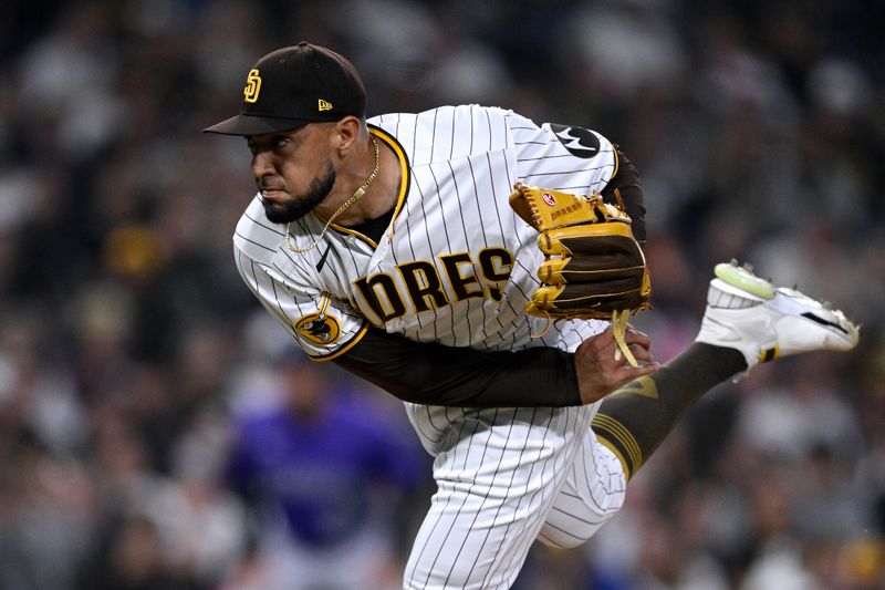 Sep 19, 2023; San Diego, California, USA; San Diego Padres relief pitcher Robert Suarez (75) throws a pitch against the Colorado Rockies during the eighth inning at Petco Park. Mandatory Credit: Orlando Ramirez-USA TODAY Sports