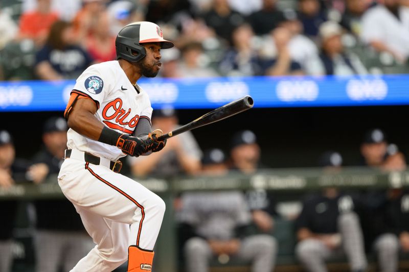 Apr 30, 2025; Baltimore, Maryland, USA; Baltimore Orioles outfielder Cedric Mullins (31) hits a single during the first inning against the New York Yankees at Oriole Park at Camden Yards. Mandatory Credit: Reggie Hildred-Imagn Images