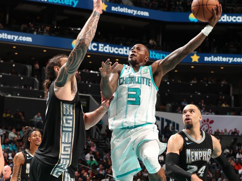 CHARLOTTE, NC - JANUARY 4: Terry Rozier #3 of the Charlotte Hornets drives to the basket during the game against the Memphis Grizzlies on January 4, 2023 at Spectrum Center in Charlotte, North Carolina. NOTE TO USER: User expressly acknowledges and agrees that, by downloading and or using this photograph, User is consenting to the terms and conditions of the Getty Images License Agreement. Mandatory Copyright Notice: Copyright 2023 NBAE (Photo by Kent Smith/NBAE via Getty Images)