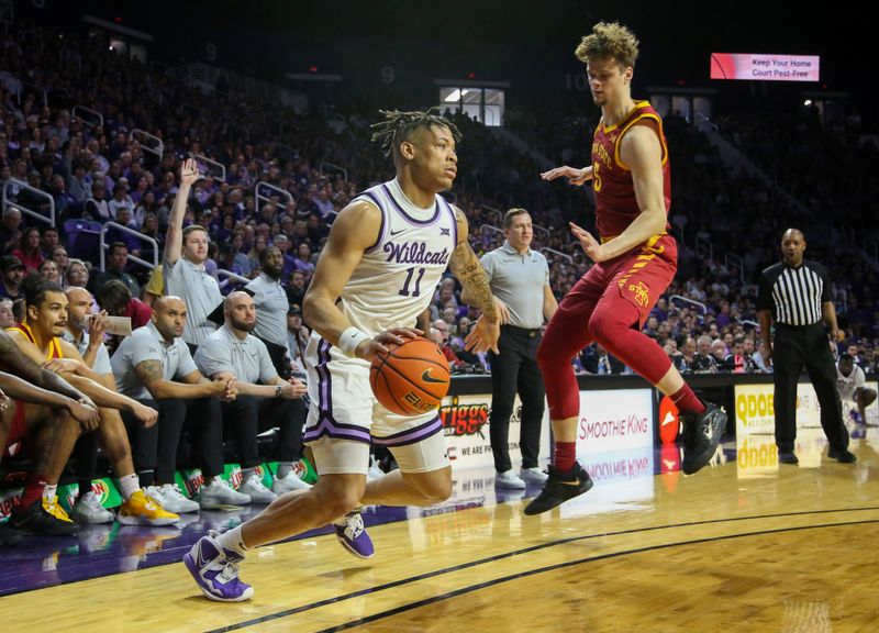 Feb 18, 2023; Manhattan, Kansas, USA; Kansas State Wildcats guard Keyontae Johnson (11) dribbles past Iowa State Cyclones forward Alja   Kun   (5) during the first half at Bramlage Coliseum. Mandatory Credit: Scott Sewell-USA TODAY Sports