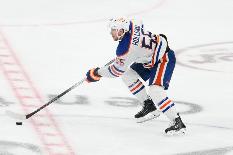 May 31, 2024; Dallas, Texas, USA; Edmonton Oilers left wing Dylan Holloway (55) in action against the Dallas Stars during the third period between the Dallas Stars and the Edmonton Oilers in game five of the Western Conference Final of the 2024 Stanley Cup Playoffs at American Airlines Center. Mandatory Credit: Chris Jones-USA TODAY Sports