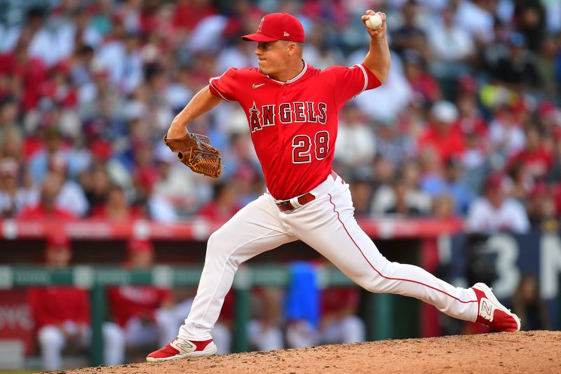 Jul 19, 2023; Anaheim, California, USA; Los Angeles Angels relief pitcher Aaron Loup (28) throws against the New York Yankees during the ninth inning at Angel Stadium. Mandatory Credit: Gary A. Vasquez-USA TODAY Sports