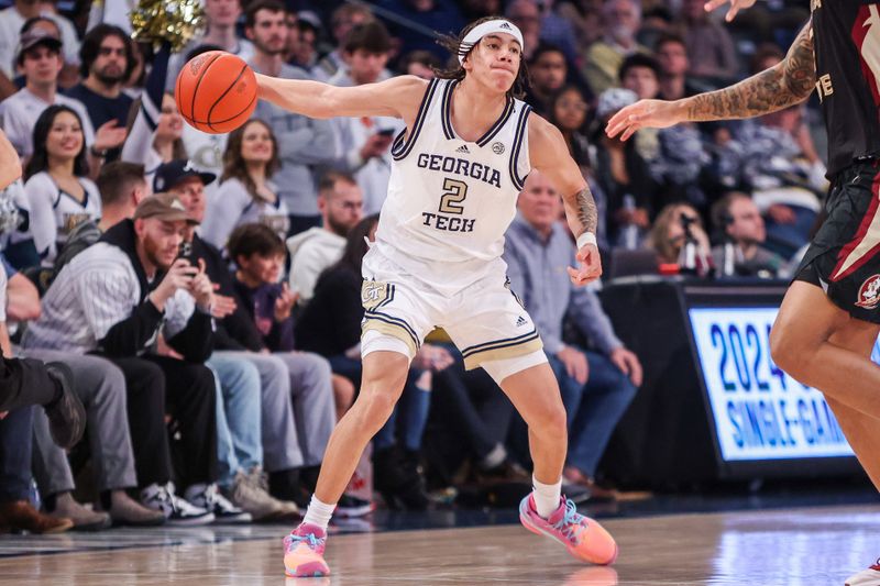 Mar 2, 2024; Atlanta, Georgia, USA; Georgia Tech Yellow Jackets guard Naithan George (2) passes the ball against the Florida State Seminoles in the second half at McCamish Pavilion. Mandatory Credit: Brett Davis-USA TODAY Sports