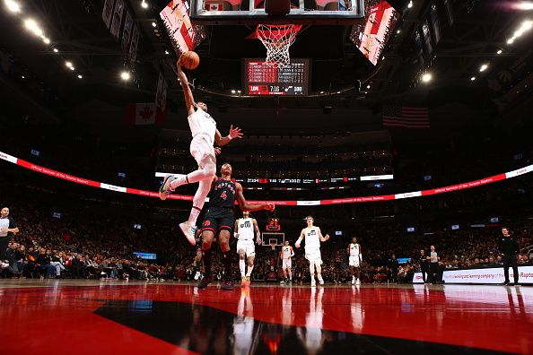 TORONTO, CANADA - DECEMBER 23:  Ochai Agbaji #30 of the Utah Jazz drives to the basket during the game against the Toronto Raptors on December 23, 2023 at the Scotiabank Arena in Toronto, Ontario, Canada.  NOTE TO USER: User expressly acknowledges and agrees that, by downloading and or using this Photograph, user is consenting to the terms and conditions of the Getty Images License Agreement.  Mandatory Copyright Notice: Copyright 2023 NBAE (Photo by Vaughn Ridley/NBAE via Getty Images)